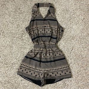 Sleeveless romper with pockets